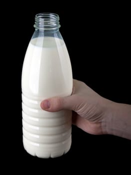 Human hand holding healthy eating milk food bottle