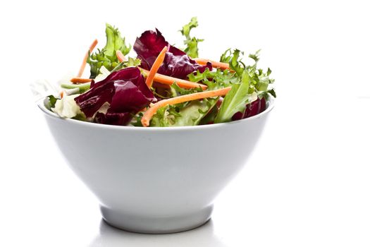mixed salad on a bowl - withe background