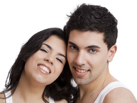 Beautiful and attractive young couple standing over a white background