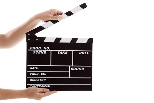 Female hands holding a clapboard, isolated on white