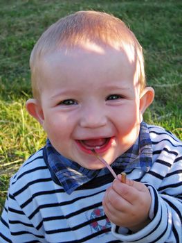 Little child smiling for happiness and fun