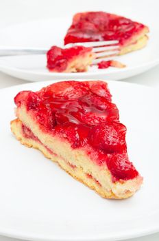 Slices of Homemade Strawberry Pie With Jelly on White Plate