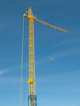 Tower crane with steel hook building metal construction