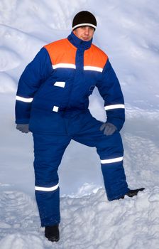 man, person, standing,  coveralls, uniform, warm, wear, winter, snow,  work, overall, personnel, professional, technical,  builder, worker, garment, hat, protective, suit, manpower, activity, black, boots, cap, clothing, collar, blue, color, jacket,  pockets, protection, red, security, strip, services, sign, sleeve, suit