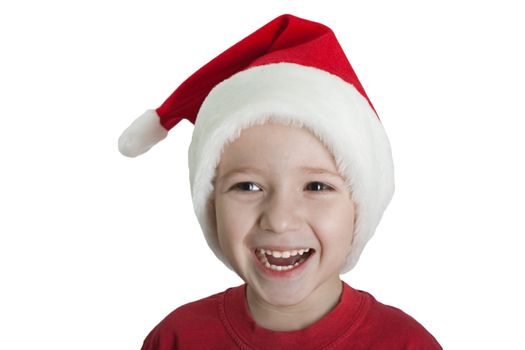 Little child in christmas holiday red Santa hat