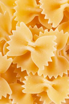 Closeup view of dried bow shaped macaroni