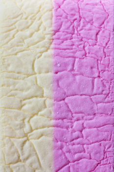 Closeup view of a marhmallow. Colorful background