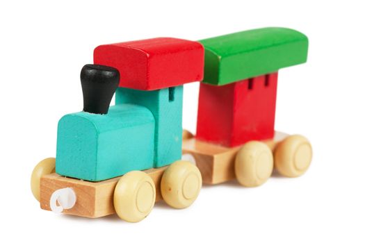 Little wooden toy train isolated over white background