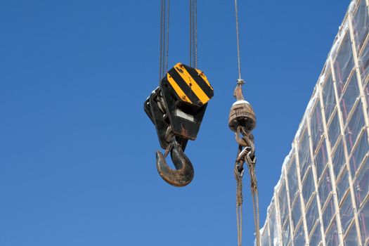 Tower crane with steel hook building metal construction