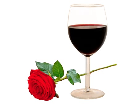 A glass of red wine and a red rose isolated on white