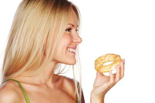 woman eating a cake on a white background