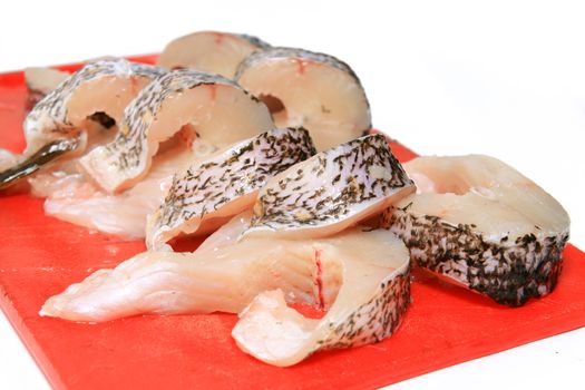 cut fish on white background