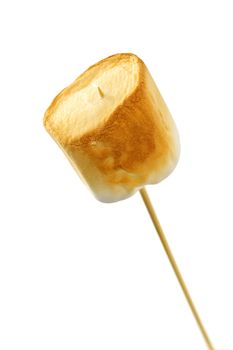 Golden toasted marshmallow on a wooden skewer