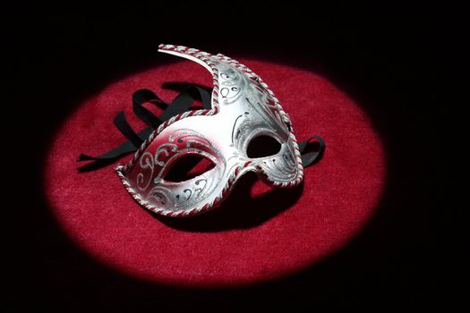 Close up  of carnival mask under the spotlight