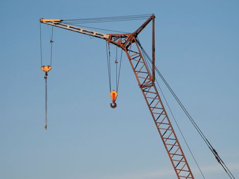 Building crane boom with steel hook