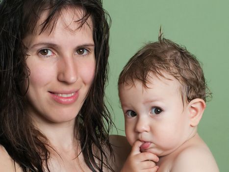 Smiling mother and little child - family happiness