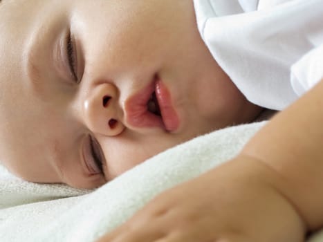 Little child sleeping in happiness and family love