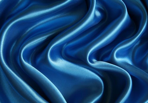 Smooth elegant dark blue silk can use as background 