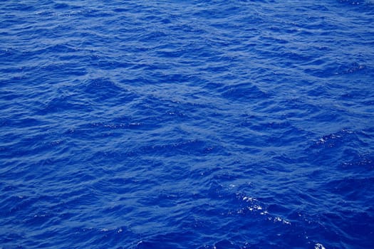 Blue sea water surface with ripple as background