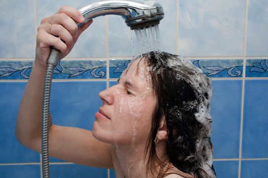 Beauty women take shower in bathroom for hair care