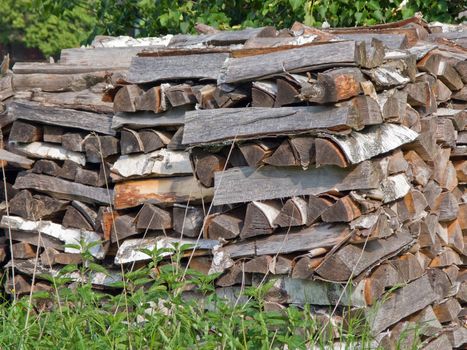 Stack of wood log or heap of lumber firewood