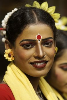 Indian dancer in traditional tribal outfit at the Sarujkund Craft Fair in Haryana near Delhi, India.