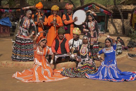 Tribal dancers and musicians at the annual Sarujkund Fair near Delhi, India.