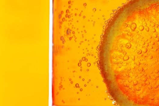 lemon slice in water bubbles