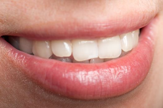 Smiling women - human female beauty teeth and lips