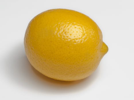 Citrus food - yellow healthy lemon fruit on white