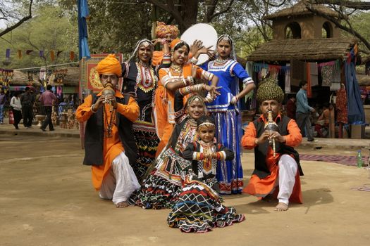 Tribal dancers and musicians at the annual Sarujkund Fair near Delhi, India.