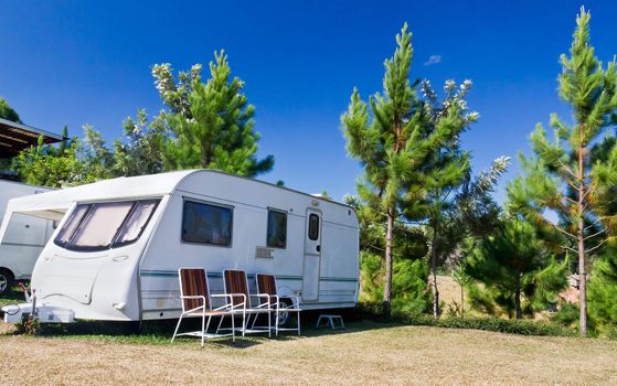 Caravans  camping in the park with background mountains