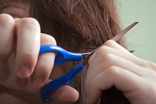 Beauty women cutting hair for fashion with care