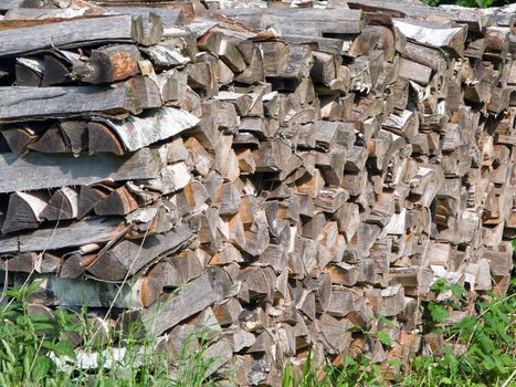 Stack of wood log or heap of lumber firewood