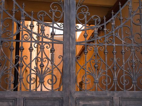 Old metal gate and security closed entrance door