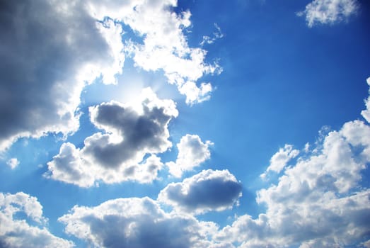 blue sky background with tiny clouds