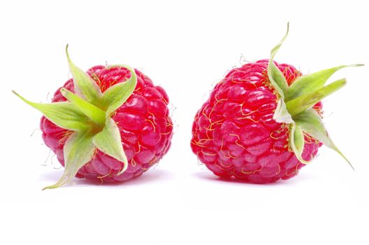 Ripe raspberry isolated on a white background