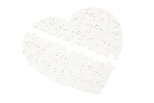 heart made from the puzzle on white
