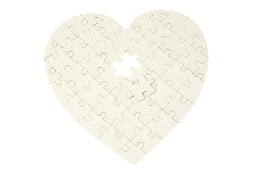 heart made from the puzzle on white