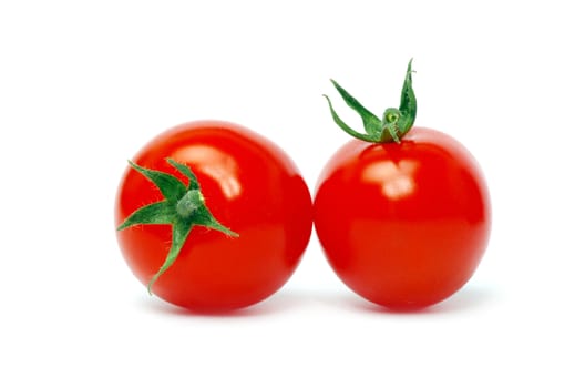 Fresh tomatoes isolated on white