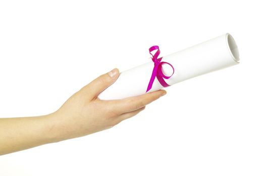 Diploma with a red ribbon in hand isolated on white 