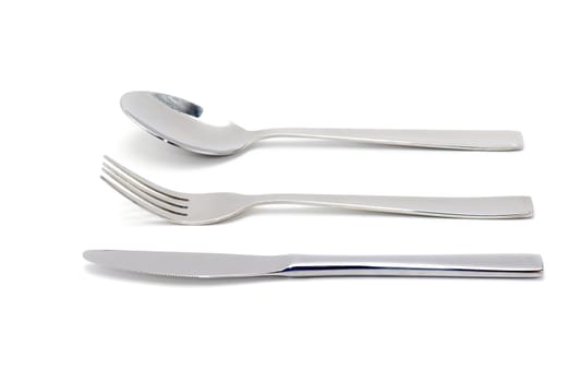 Fork, spoon and knife isolated on white background