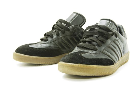 A pair of men's running shoes on white
