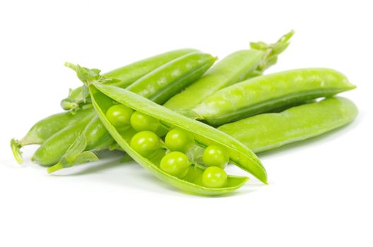 green peas vegetable closeup isolated on white