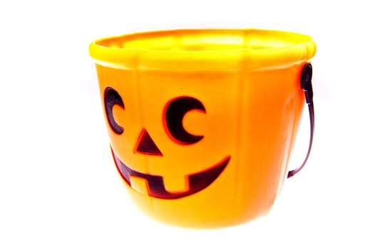 an orange halloween bucket