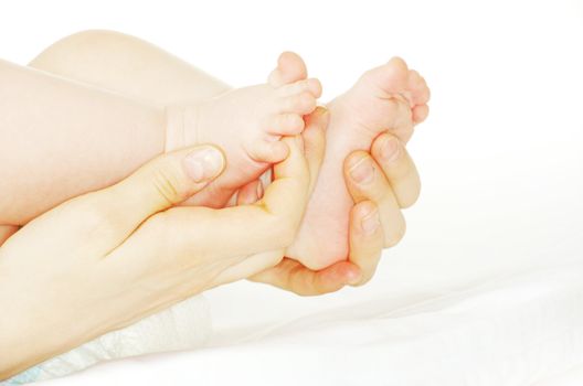 newborn baby feet and hands isolated on white