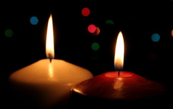 A closeup of red and white Christmas candles.