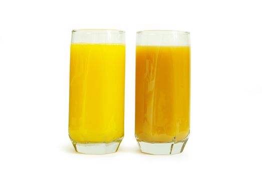 peach juice in glass isolated on white background