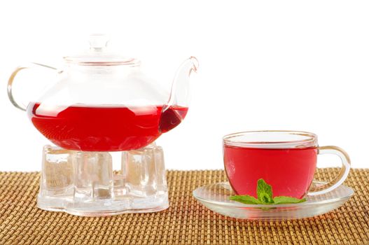 Tea being poured into glass tea cup