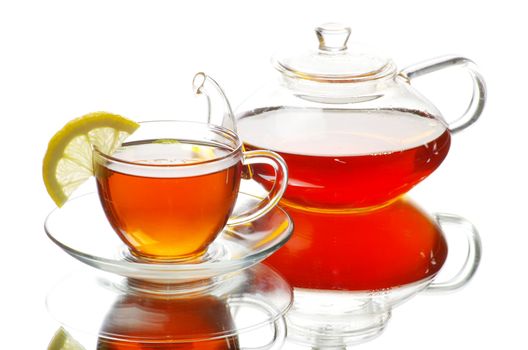 Tea being poured into glass tea cup